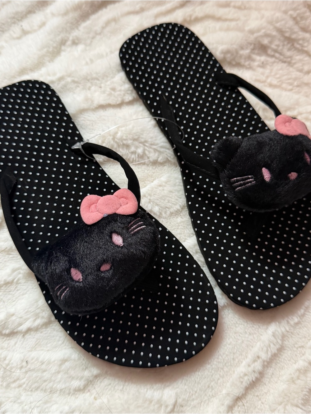 Black Polka Dot Flip Flops with Plush Cat Accent